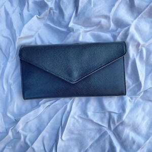 Roots black leather wallet, 7.5” x  4” x 0.5”